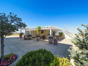 View of Common area patio featuring a pergola