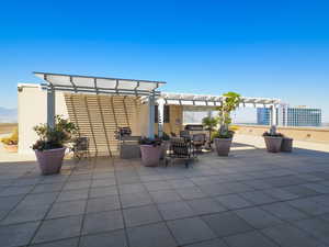 View of Common area patio featuring a pergola