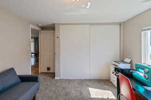 Office featuring carpet floors and baseboards