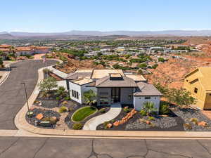 Aerial view of residential area with mountains