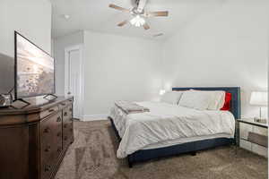 Bedroom with carpet floors and ceiling fan