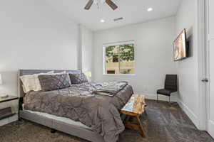 Bedroom with carpet floors, a ceiling fan, and recessed lighting