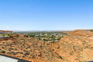 View of mountain background featuring nearby suburban area