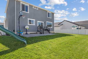 Back of property with stucco siding