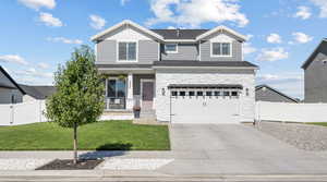 Craftsman inspired home featuring concrete driveway, an attached garage, stone siding, covered porch, and roof with shingles