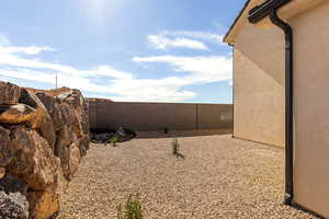View of fenced backyard