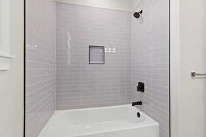 Bathroom with bathing tub / shower combination