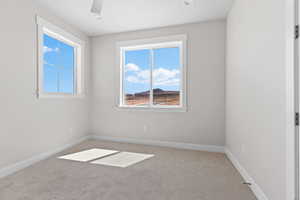 Unfurnished room with carpet flooring, a ceiling fan, and recessed lighting