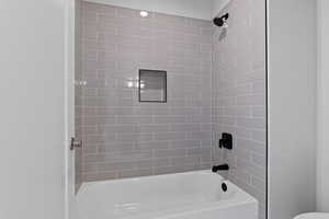 Full bathroom featuring shower / tub combination