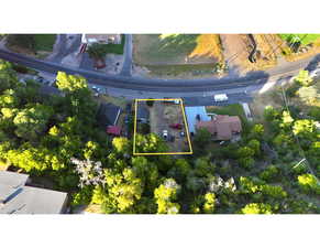 Aerial view of property's location featuring property parcel outlined