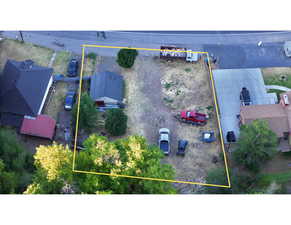 Aerial view of property's location with property parcel outlined