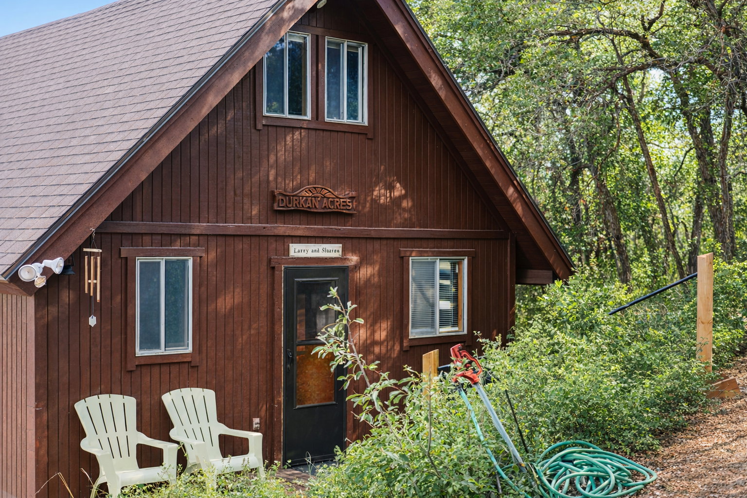front view of house with a shingled roof brightebed with chat gpt