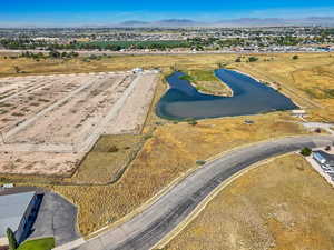 View of property location featuring a water and mountain view