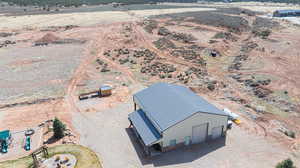 Birds eye view of property featuring a desert view