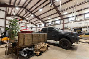 Garage featuring a garage door opener