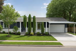 Ranch-style house with a garage, roof with shingles, and concrete driveway