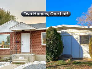 View of front of home featuring brick siding