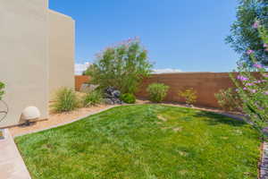 View of fenced backyard