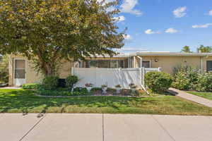 Single story home with brick siding