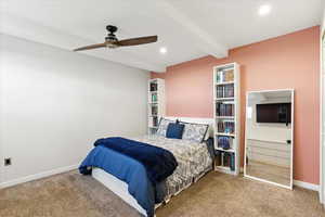 Bedroom featuring beamed ceiling, carpet, recessed lighting, and ceiling fan