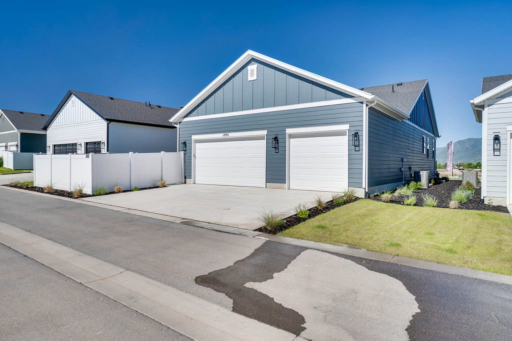 Contemporary exterior featuring blue siding and white trim