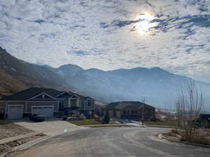 View of mountain background featuring nearby suburban area