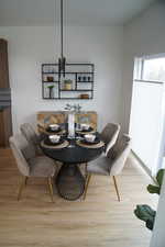 Dining space with light wood-style floors