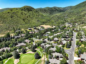Aerial view of residential area with a mountainous background
