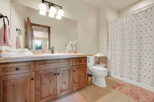 Bathroom featuring vanity and tile patterned flooring