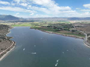 View of property location with a water and mountain view