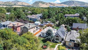 Aerial view of residential area with a mountainous background
