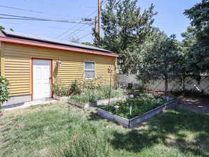 View of yard with a vegetable garden
