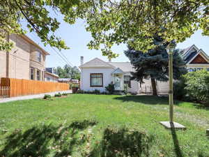 Rear view of house with roof with shingles
