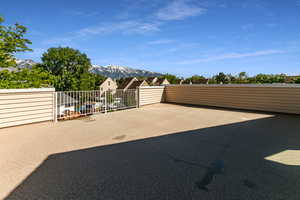 View of patio with a mountain view and a residential view