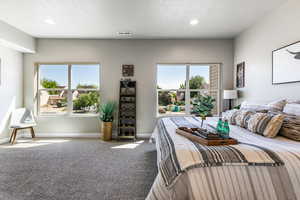Bedroom featuring carpet flooring and recessed lighting