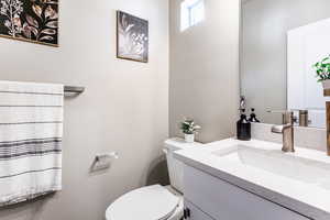 Bathroom featuring toilet and vanity