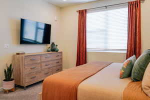 View of carpeted bedroom