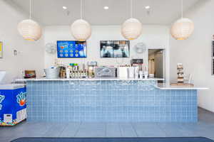 Reception featuring recessed lighting and wood walls
