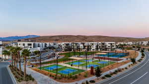 Aerial view at dusk of a mountain view and a residential view