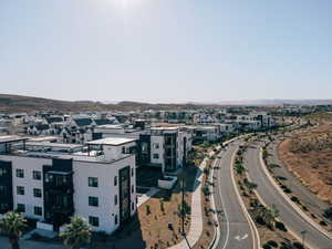 Aerial view of residential area featuring mountains