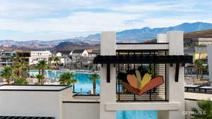 View of swimming pool featuring a mountain view and a residential view