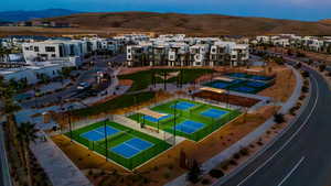 Aerial perspective of suburban area featuring a mountainous background