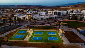 Aerial view of residential area with a mountainous background