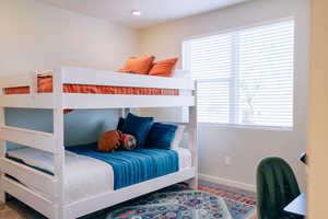Bedroom with baseboards