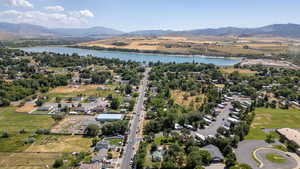 Aerial view of residential area featuring a water and mountain view