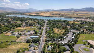 Aerial view of residential area featuring a water and mountain view