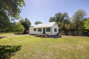 View of front of property with a metal roof