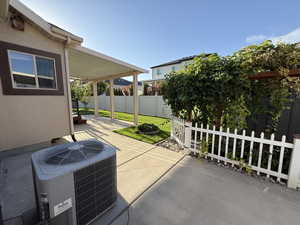 Fenced backyard featuring a patio area