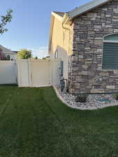 View of yard featuring a gate West Side of Home