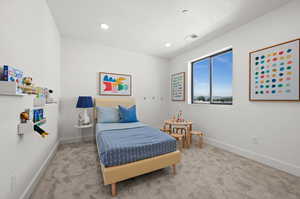 Bedroom featuring carpet and recessed lighting